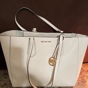 Brand new, Michael Kors tote with two removable clutch and wallet
